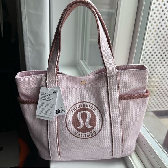 lululemon athletica Handbags - NWT 6.5L Lululemon Daily Multi-Pocket Mini Cotton Canvas Tote Bag Blissful Pink